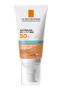Sunscreen tube with a white and orange design. Contains UV protection text, 50+ SPF label, and a pump dispenser. Smooth, glossy finish.