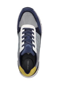Men's sneaker featuring a mesh and suede upper in navy, grey, and white with a yellow accent at the heel, and flat blue laces.