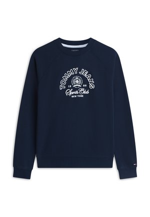 Μακρυμάνικο φούτερ σε ναυτικό μπλε, με λευκό λογότυπο και έμβλημα "Tommy Jeans Sports Club New York 1985" στο κέντρο του στήθους.