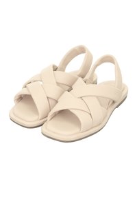 Beige Sandalen mit einem Kreuzriemen-Design, aus weichem Material, offener Zehenbereich und gepolsterter Sohle. Flexibler Fersenriemen für einen sicheren Sitz.