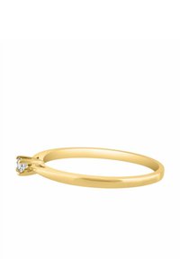 Złoty pierścionek z cienką obrączką i gładkim wykończeniem, z dwoma małymi diamentami osadzonymi z przodu w oprawie typu pazurki.