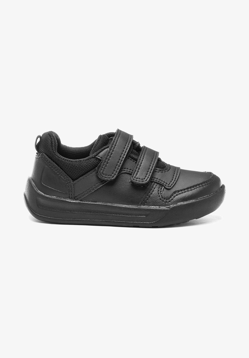 Baskets pour enfants en cuir noir avec deux bandes Velcro, col rembourré et semelle coussinée, affichées en profil latéral sur fond blanc.