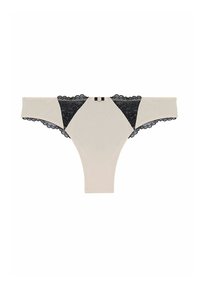 Béžové tanga s černými krajkovými akcenty, vlnitými okraji a středovou dekorativní mašlí. Měkká, hladká látka s minimalistickým designem.