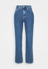 High-waisted, straight-leg denim jeans in mid-blue with a faded wash, featuring a zipper fly and raw hem at the ankle.