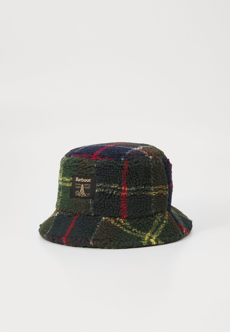 Groene, rode en marineblauwe geruite fleece bucket hat. Heeft een zwart label met logo aan de zijkant. Zachte textuur, brede rand.