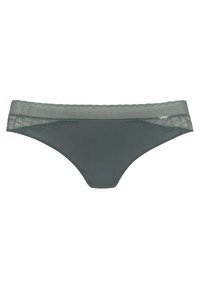 Tamsiai žalia bikini stiliaus apatiniai, pagaminti iš lygios medžiagos su nėriniuotu juosmeniu ir banguotais kraštais, su mažyte metaline firmos etiketė.