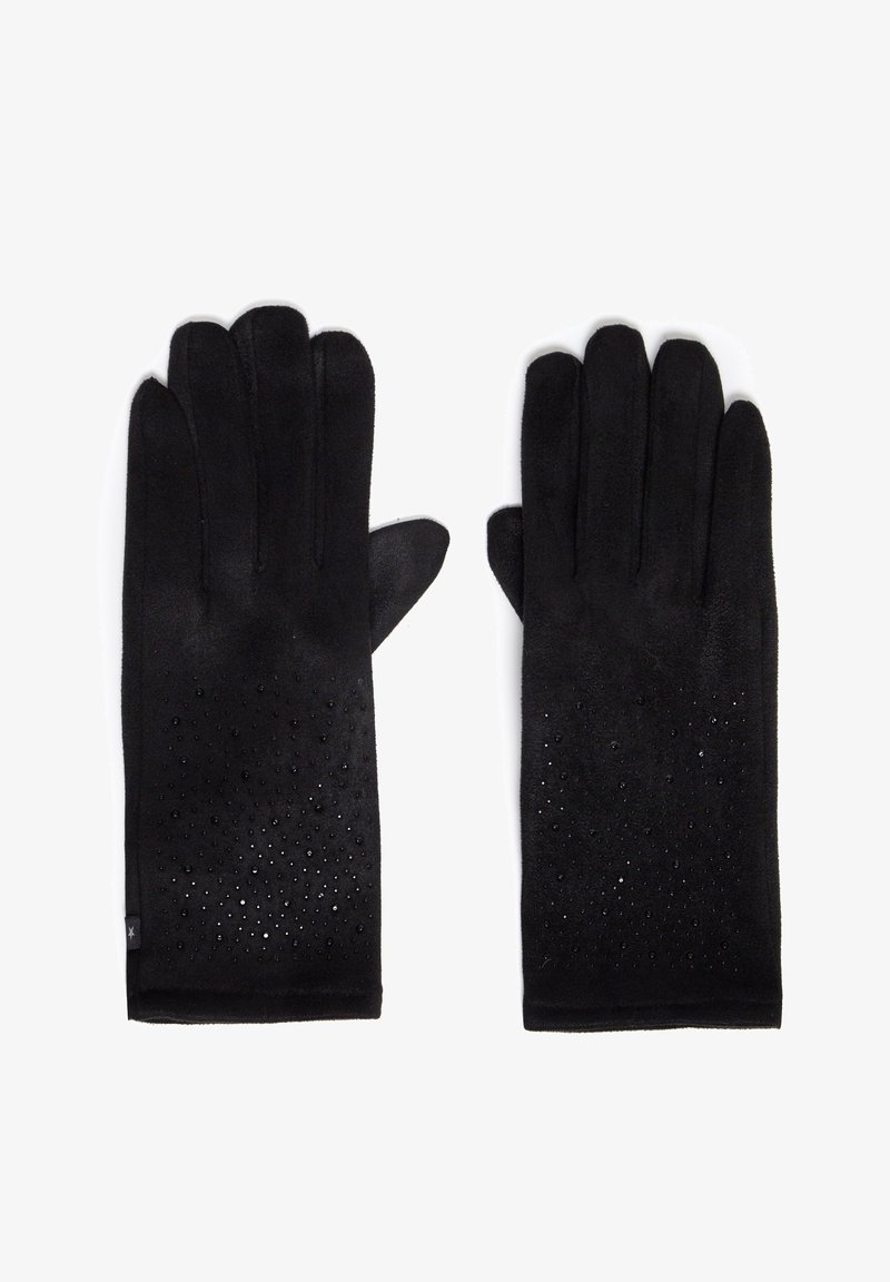 Mustad mustreid mustast pehmest materjalist, millel on sile tekstuur ja dekoratiivsed perforatsioonid ning väiksed kaunistused peopesa küljel.