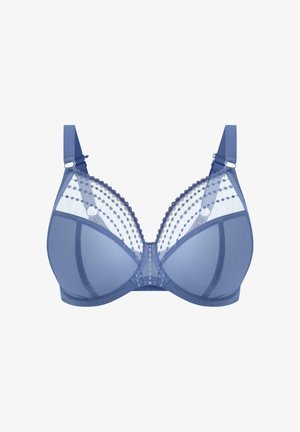Soutien-gorge bleu à armatures avec panneaux supérieurs transparents, motif à pois et bordure en dentelle festonnée. Bretelles réglables et tissu à texture lisse.