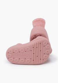 Weiche rosa Schuhe mit einer flexiblen Gummisohle und einem strukturierten Stricksockendesign. Verfügt über ringförmige Griffe an der Unterseite für bessere Traktion.
