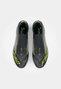 adidas Performance F50 ELITE LL FG - Nogometne kopačke za čvrstu podlogu - core black/iron metallic/lucid lemon