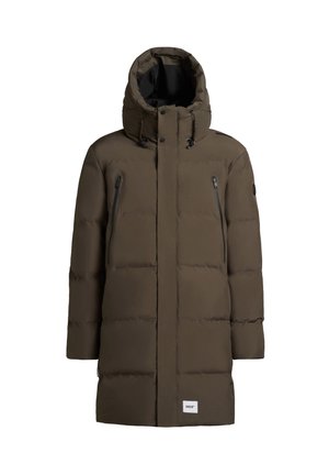 Olive green puffer coat with a tall hood, two front zip pockets, and a branded patch. Features a boxy silhouette and stitched panel design.
