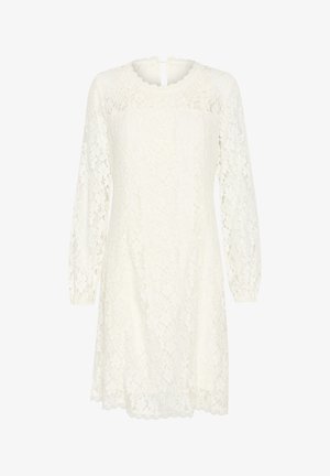 Valge pitskleit pika varrukaga, ümmarguse kaelusega ja võtmekaeva seljaga. Omab lillelist mustrit ja lainelist äärt. Kerge, tekstuuriga kangas.