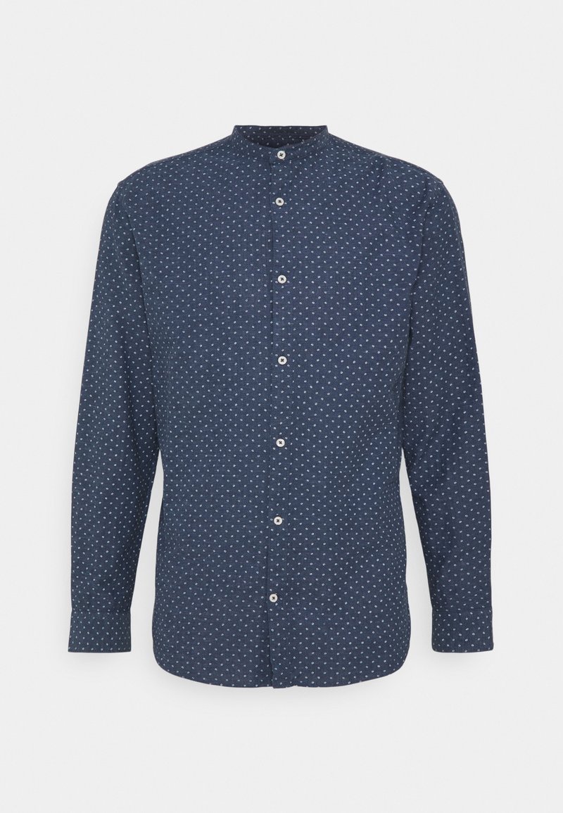 Navy blue long-sleeve shirt with a stand collar, featuring a small white polka dot pattern and buttons down the front. Soft fabric texture.