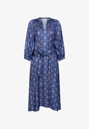 Niebieska sukienka midi z fioletowymi kwiatowymi i okrągłymi wzorami, długie bufiaste rękawy, dekolt w serek oraz kokardą wiązaną w talii.