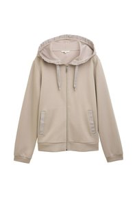 Beige zip-up hoodie met een contrasterende lichtgrijze binnenkap. Voorzien van zijzakken en een zachte, gestructureerde stof. Verstelbare trekkoorden.