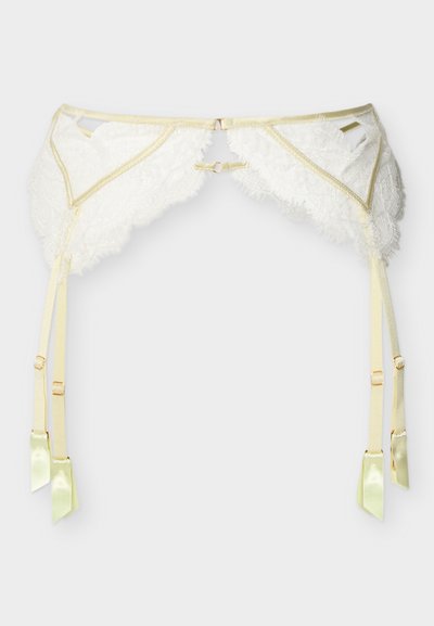 Κρέμ ζώνη καλτσοδέτας από δαντέλα με ρυθμιζόμενους ιμάντες και λεπτομέρειες από σατέν κορδέλα, σχεδιασμένη για να στηρίζει κάλτσες.