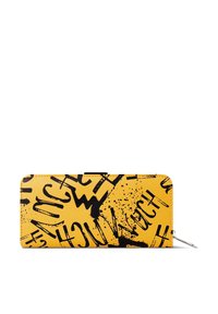 Yellow wallet with black graffiti-style text and graphic accents. Smooth material, zip closure, rectangular shape, contrasting colors.