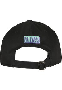 Black baseball cap with adjustable strap and a rectangular embroidered logo in green and purple on the back. Wrinkled fabric texture.
