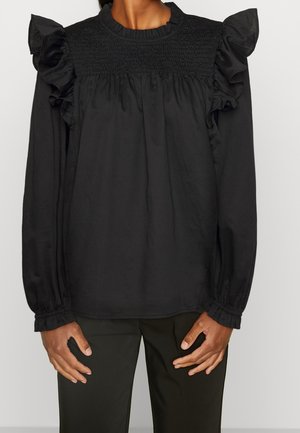 Blusa nera a maniche lunghe con scollatura e maniche arricciate, caratterizzata da dettagli arricciati sul corpetto. Tessuto morbido e leggero.