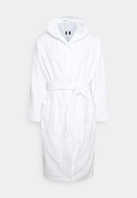 White terry cloth bathrobe with hood, long sleeves, two front pockets, and a tied waist belt. Soft texture and knee-length design.