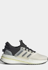 Sportssko med en overdel i sort mesh, gennemsigtig sidepanel, hvid støddæmpende sål og reflekterende detaljer. Har en polstret krave og snørebånd.