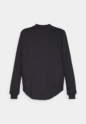 Sweat-shirt noir à manches longues, avec un ourlet arrondi et un col rond. Texture de tissu lisse ; aucun motif ni quincaillerie visibles.