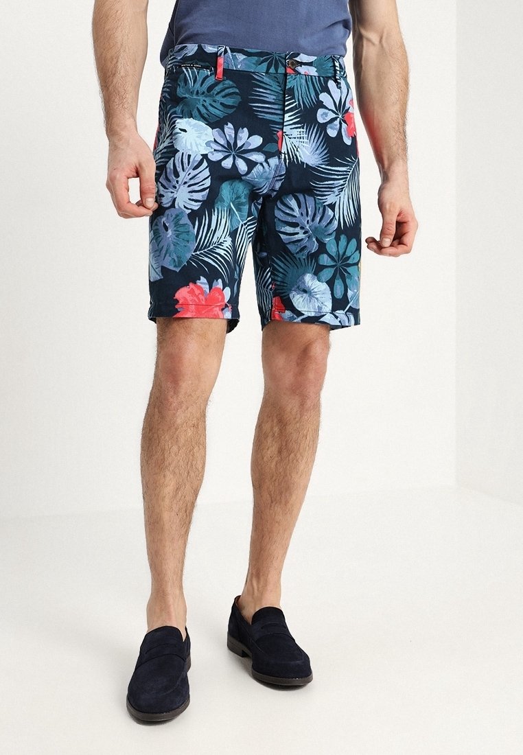 Blomsterdekorérede shorts i marineblå og lyse farver, der har en blanding af tropiske blade og blomster, med en standard pasform og sidelommer.