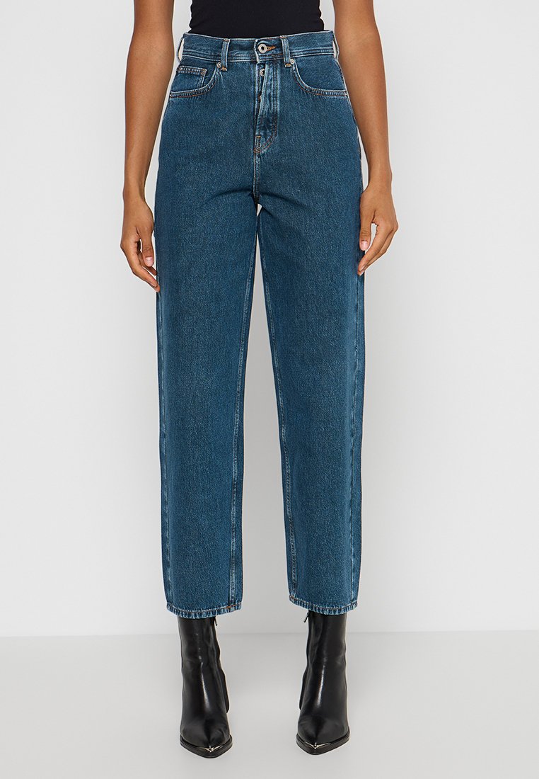 Hoge taille blauwe jeans met een rechte pijp, gemaakt van denimstof. Beschikt over een klassiek vijf-pocket ontwerp en minimale stikdetails.