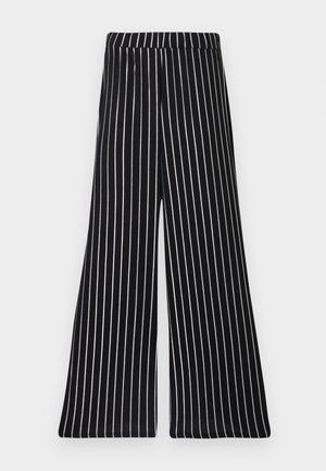 Mustat ja valkoiset raidalliset leveät housut, joissa on joustava vyötärö ja joissa on pystysuorat raidat pehmeässä ja joustavassa kankaassa.