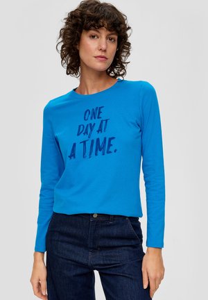 - Bluzka z długim rękawem