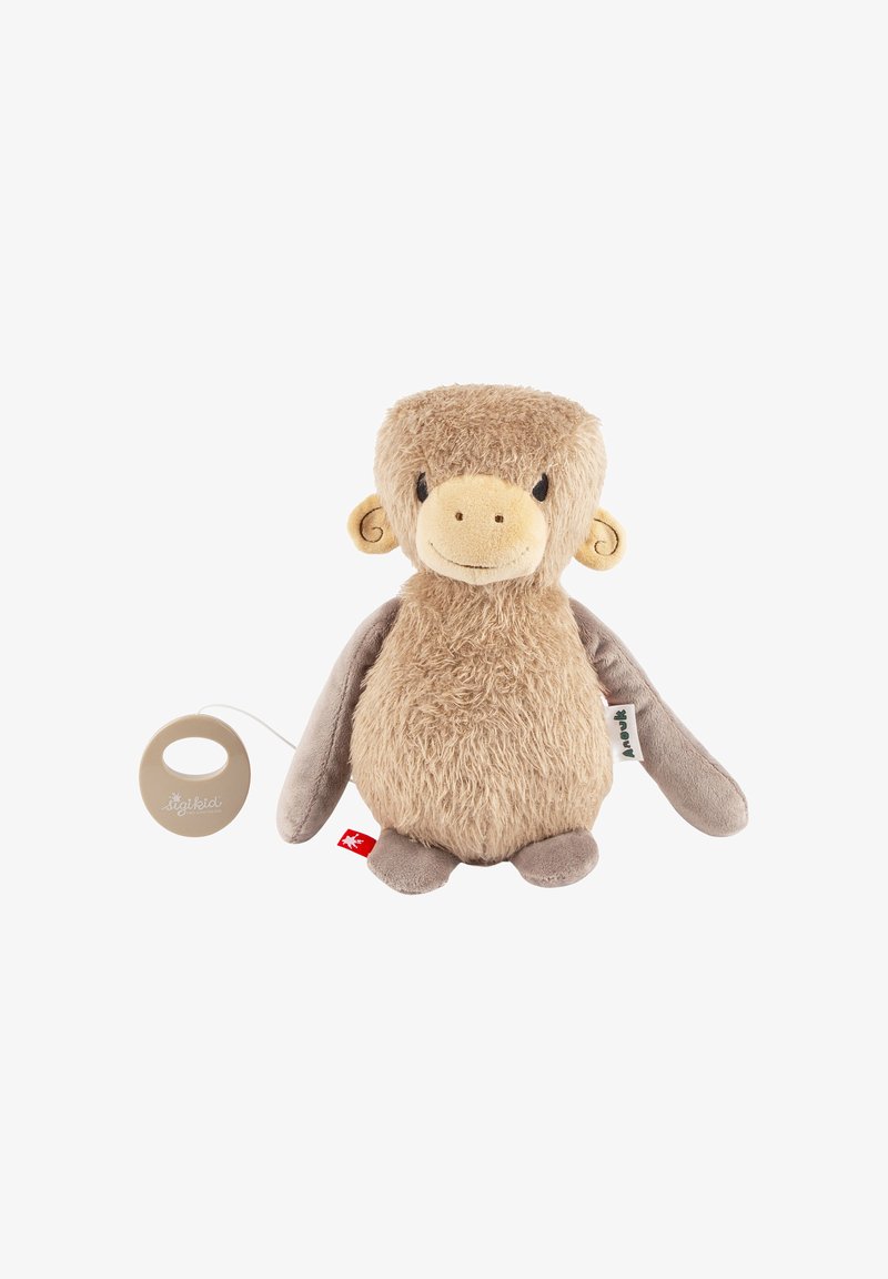 Plush monkey toy with tan fur, rounded face, and stitched features. Includes a looped pull tag for activation. Soft, textured fabric.