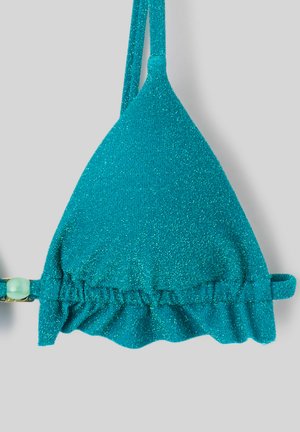 Haut de bikini pailleté bleu sarcelle avec bordure à volants et fines bretelles ornées d'une petite perle verte sur un fond clair.