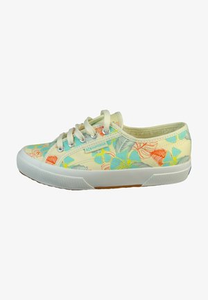 Canvas sneaker with a floral pattern in blue, orange, and green, featuring white laces and a white rubber sole with textured accents.