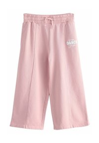 Rosa bomullsblandning korta sweatpants med elastiskt midjeband och dragsko, med texten "DANCE Studio" tryckt på sidan.