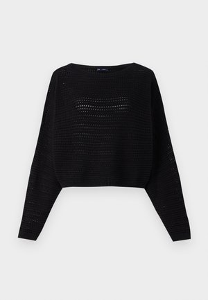 Black knitted crop sweater with long sleeves, featuring an open weave texture and a wide neckline. Ribbed hem at the bottom and cuffs.