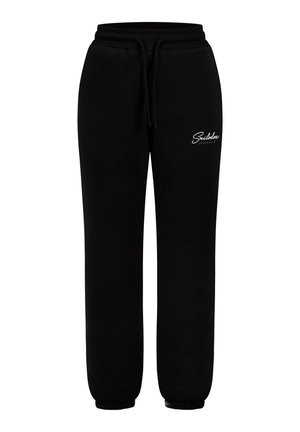 Pantalones de chándal negros hechos de una tela suave, con una cinturilla elástica y cordón, y puños en los tobillos. Pequeño detalle de logo en blanco.