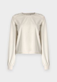 Gaiši beidzis, īss džemperis ar garām piedurknēm, piegulošām aprocēm un dekoratīvām pērlēm uz pleciem. Gluda auduma tekstūra.