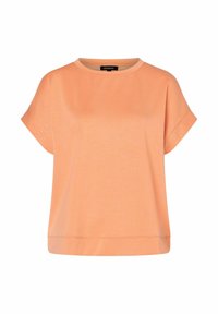 Perzikkleurig t-shirt met korte mouwen, een ontspannen pasvorm, ronde halslijn en een gladde katoenen stof. Heeft een eenvoudig, strak ontwerp en geen patronen.