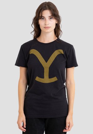 Black cotton t-shirt featuring a large gold "Y" logo on the front, short sleeves, and a crew neckline. Smooth texture, casual fit.