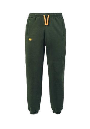 Grüne Baumwoll-Sweatpants mit elastischem Bund, orangefarbener Kordel und Seitentaschen. Mit einem kleinen gelben Elefanten-Logo auf dem Oberschenkel.