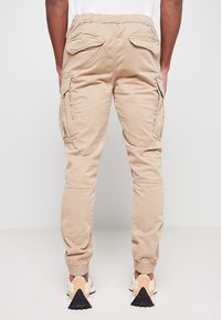 Schott Pantalon cargo - beige