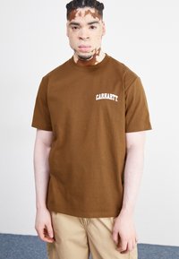 Carhartt WIP - UNIVERSITY SCRIPT - Potiskana majica - lumber/white Miniaturna slika 1