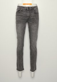 Jeans de mezclilla gris con un ajuste slim, cinco bolsillos, costuras en contraste, detalles de desgaste leves y dobladillos rectos.