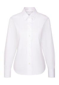 Camicia bianca a maniche lunghe con colletto e polsini appuntiti, taglio aderente e sette bottoni frontali.