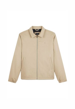 Veste beige à zip avec un col, deux poches latérales et des poignets élastiques. Tissu lisse et design minimaliste.