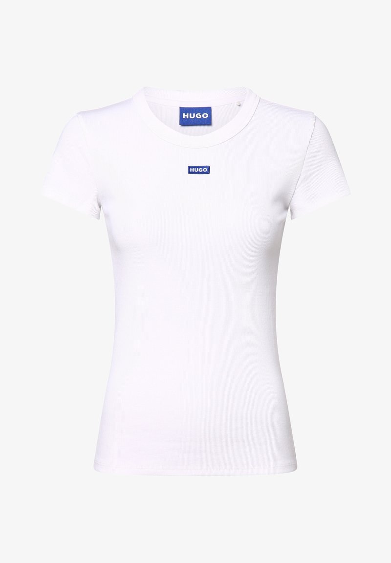 T-shirt blanc ajusté en tissu côtelé, avec un col rond et une étiquette bleue "HUGO" centrée sur la poitrine. Manches courtes.