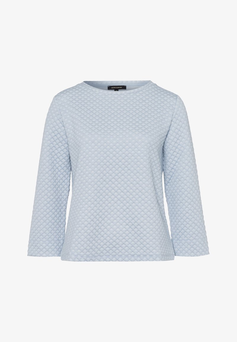 Haut bleu clair matelassé à manches longues avec un col rond et un motif en losange légèrement texturé, présenté sur un fond blanc.