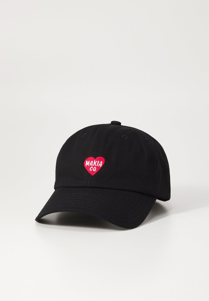 Black cotton baseball cap featuring a red heart-shaped embroidered logo with "MAKIA CO." text. Curved brim and adjustable strap.