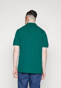 Carhartt WIP CHASE - Polo - chervil/gold