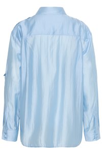 Light blue long-sleeve shirt with shiny fabric, buttoned cuffs, and a back yoke seam, shown from the back on a white background.